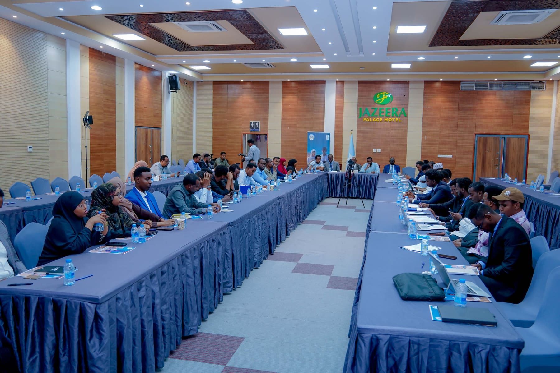 Participants seated at a meeting and workshop facilitation session in Somalia